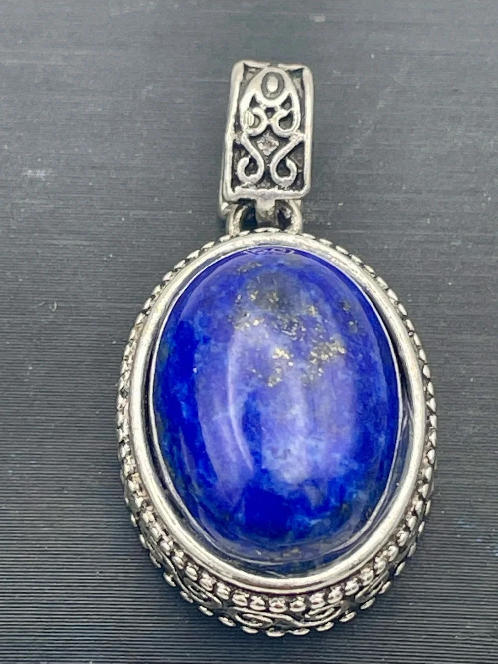 Lapis Lazuli Oval Cabochon Pendant with Silver Ornate Frame. Deep Blue Gemstone